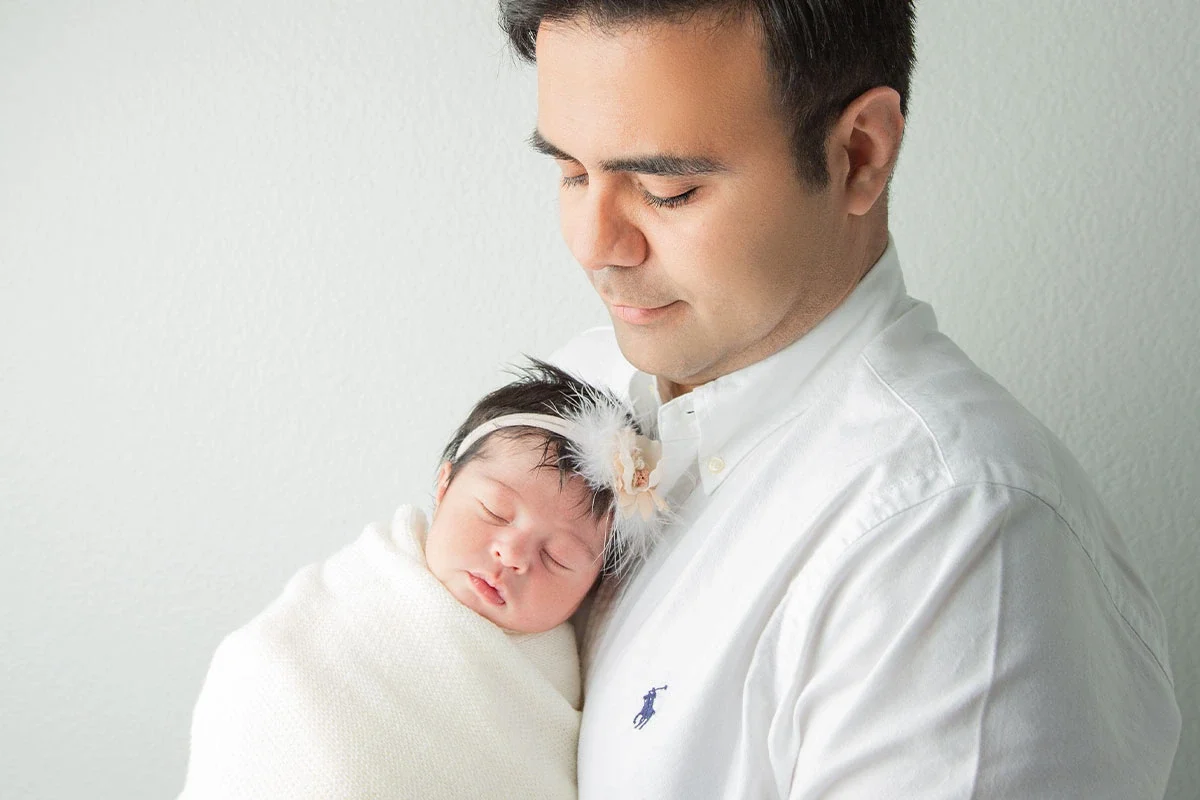 Father holding his newborn
