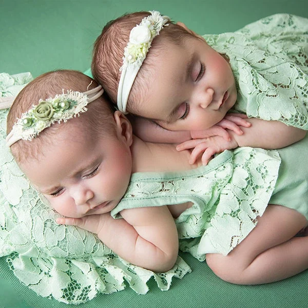 Siblings meeting their newborn